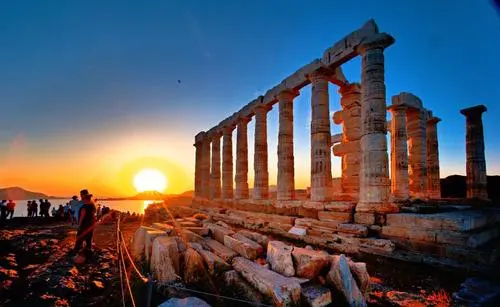Young woman with shopping bags in a beautiful dress